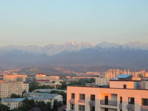 Alpine serenity deLuxe apartment with MOUNTAIN views near the ADK shopping center and Sairan METRO station